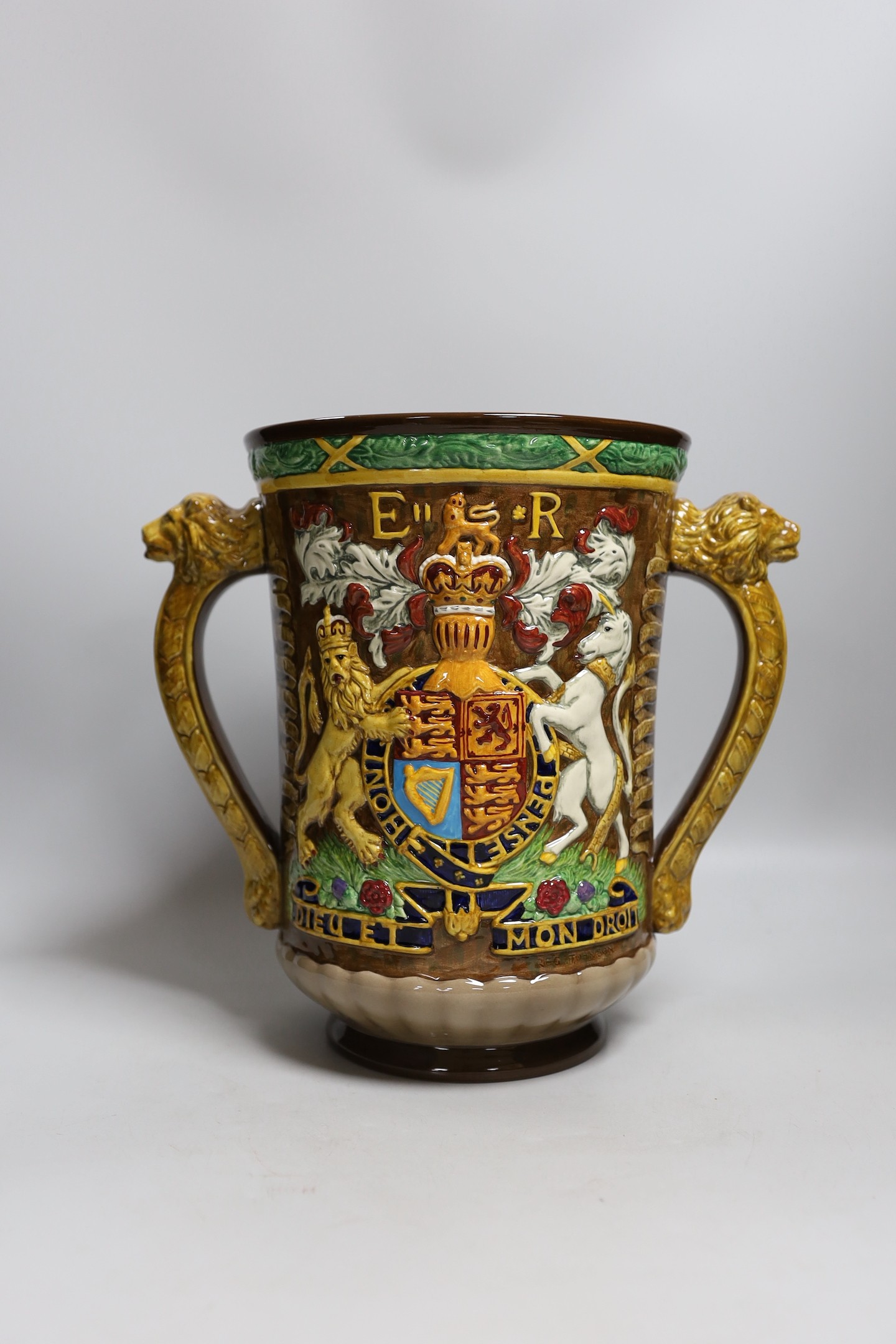 A Royal Doulton Elizabeth II silver jubilee commemorative loving cup, 1977, limited edition number 112 of 250, 27cm tall